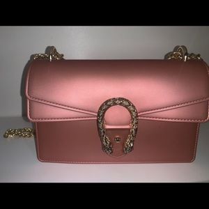 pink purse, off the shoulder
